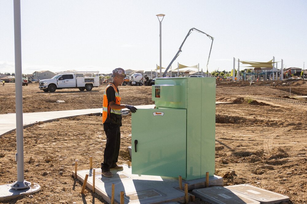 Fusion electrician wiring a site electrical enclosure
